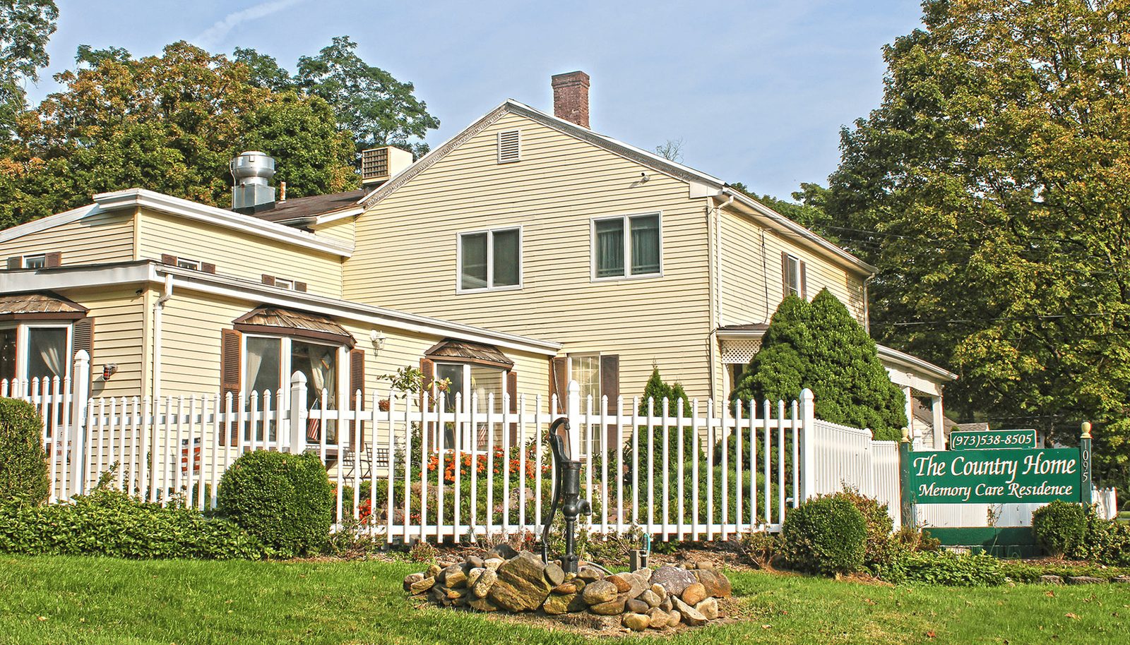 The Country Home, seen from Tabor Road behind its white picket fence