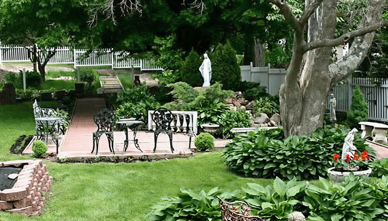 The garden with its benches and mature trees